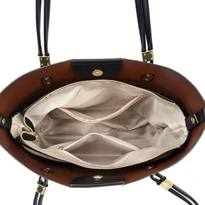 Detailed interior view of a large capacity commuter tote bag with multiple pockets