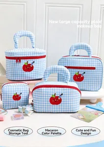 Set of blue and white plaid makeup bags featuring cute embroidered apple design detail