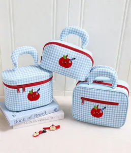 Blue and white checkered cosmetic bags with cute red apple embroidery detail.