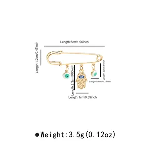 Detailed dimensions and weight of the evil eye and Hamsa hand safety pin brooch.