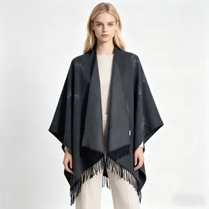 Elegant dark grey knit shawl featuring gingko leaf patterns and stylish tassel hem details