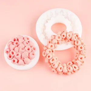 Macro view of pink raspberry fruit ring silicone mold with realistic texture details