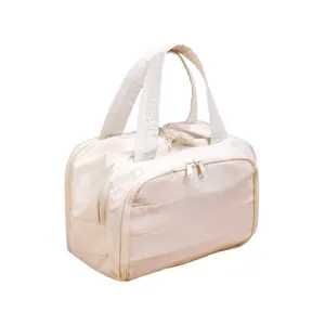 Large capacity travel cosmetic bag with multiple compartments in off-white quilted fabric