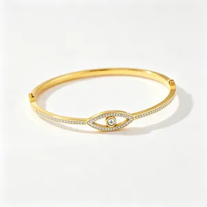 Gold-plated stainless steel evil eye bangle bracelet with paved crystals