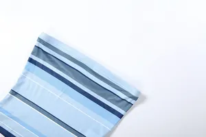 Detailed view of blue horizontal striped mesh fabric with fine texture and flat seams