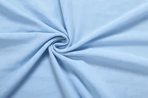 Macro view of light blue breathable mesh fabric texture for women's apparel set