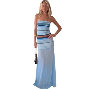 Elegant two-piece set featuring a striped tube top and light blue sheer mesh maxi skirt detail