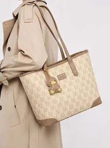 Large capacity monogram printed tote bag for women stylish beige shoulder bag with charm