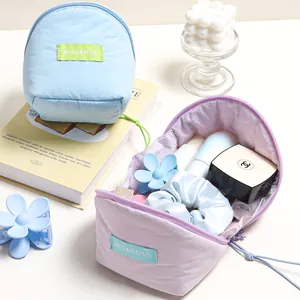 Pastel macaron cloud makeup bags in blue and lavender with large storage interior