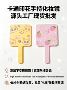 Portable handheld makeup mirror with cute cartoon cat and peach patterns for daily use