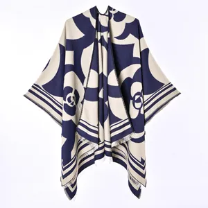 Warm reversible cashmere-like poncho shawl with camellia floral pattern and fringe