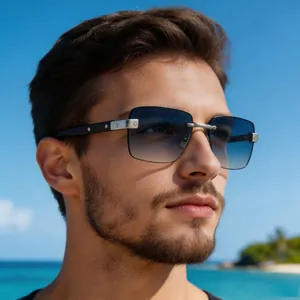 Primer plano de gafas de sol para hombre sin montura con lentes degradadas azul.