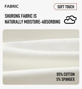 Macro view of soft 95% cotton white knit fabric used for premium baby apparel details