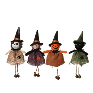 Set of four Halloween burlap hanging dolls with pumpkin and witch designs for decor.