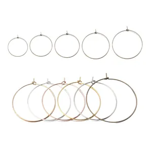 Assorted metal hoop earring components for DIY jewelry making in various sizes and finishes