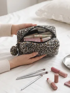 Large capacity leopard print plush cosmetic bag with a cute pom-pom keychain charm