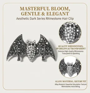 Detail view of a Gothic bat hair clip embellished with sparkling rhinestones.