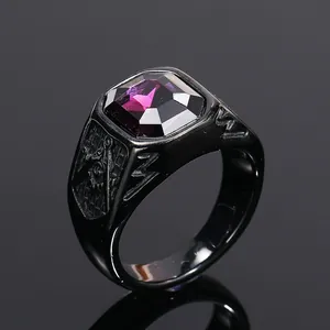 Macro view of black titanium steel men's ring featuring a square cut purple gemstone