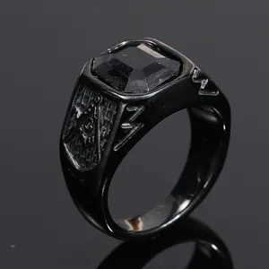 Macro view of a black Freemasonry signet ring with a square black gemstone
