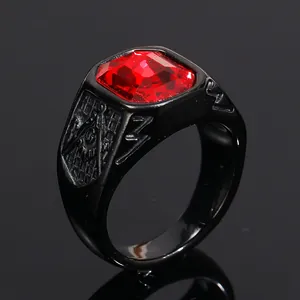 Close-up of black titanium steel Freemason ring with rectangular red gemstone detail