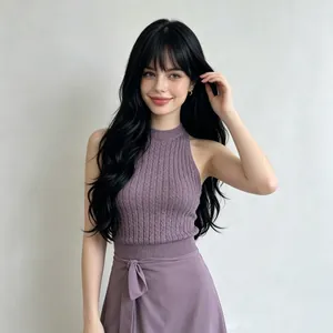 Beautiful long wavy black synthetic hair wig with bangs shown on a professional model