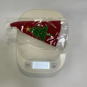 Lightweight Christmas tree embroidery non-woven cutlery holder weighing 5.8g on a scale