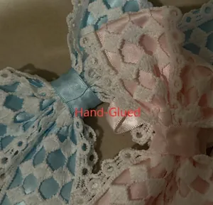 Close-up detail of handmade lace ribbon bows showing premium fabric texture and craft