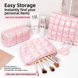 Iridescent puffer quilted makeup bag for cosmetic and skincare storage.