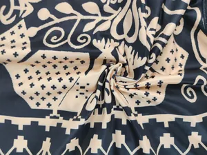 Detailed close-up showing the texture and black-beige floral print of the summer fabric
