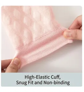 Detailed macro view of the pink baby thermal underwear cuff showing high elasticity texture
