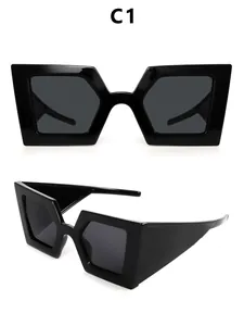 Detaillierte Makroansicht der übergroßen schwarzen Polygon-Sonnenbrille für Damen mit UV-Schutz