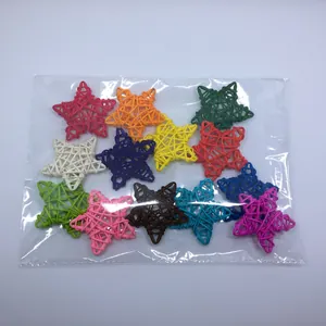 Detailed view of multi-colored 9cm rattan woven stars in transparent bag packaging