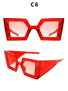 Detailansicht der modischen übergroßen roten polygonalen Sonnenbrille mit UV-Schutz
