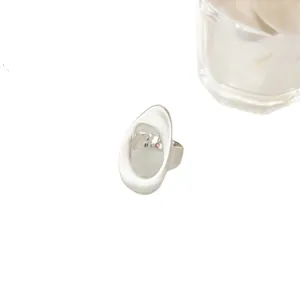 Minimalist geometric hollow oval open ring in brushed silver finish for modern women