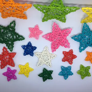 Detailed view of colorful hand-woven wicker star decorations in various sizes and shades