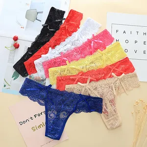 Detailed view of colorful lace T-back thongs with delicate floral patterns and bow accents