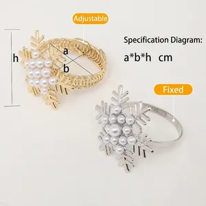 Close-up detail showing adjustable and fixed snowflake pearl napkin rings in gold and silver