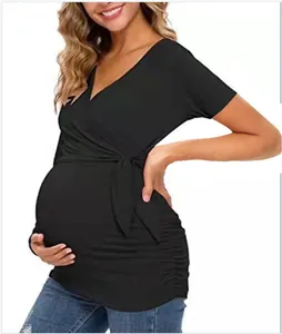 A stylish black V-neck maternity nursing T-shirt with wrap design and side tie