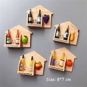Detailed view of five 3D miniature wooden house fridge magnets with wine and fruits