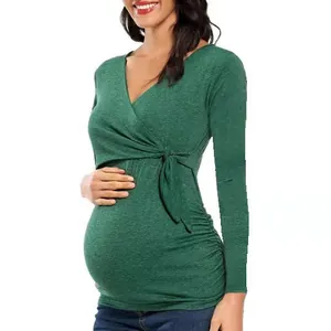 Green long sleeve maternity nursing top with cross wrap V-neck and side tie detail