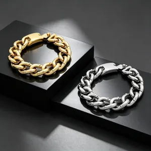Heavy 18mm Cuban link bracelet for men with rivet details, gold and silver options.