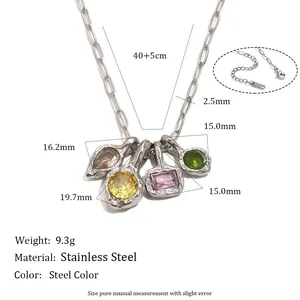 Vue détaillée d'un collier en acier inoxydable avec des breloques en zircone colorée