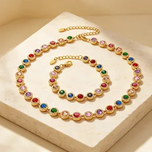 Luxury gold-plated titanium steel jewelry set featuring colorful crystal necklace and bracelet