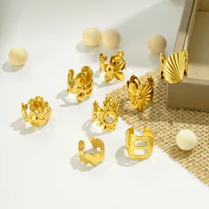 Set di orecchini a clip in acciaio inossidabile dorato con motivi floreali e geometrici