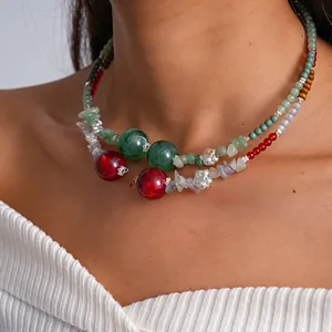 Detail of retro double-layer choker with green and red marbled beads and crystals