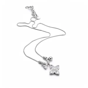 Elegant silver four-leaf clover flower pendant necklace with sparkling cubic zirconia
