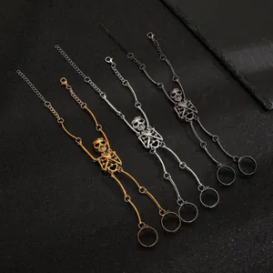 Gothic punk skeleton skull slave bracelet with finger ring in three metallic finishes