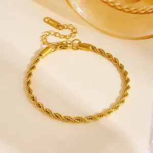Detailed view of gold twisted rope bracelet made of stainless steel with adjustable chain