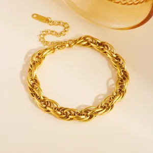 Close-up detail of a gold-plated layered twisted link stainless steel fashion bracelet