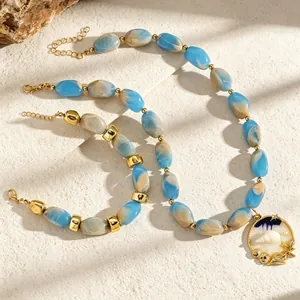 Blue and white marbled resin bead necklace and bracelet jewelry set with sea shell pendant